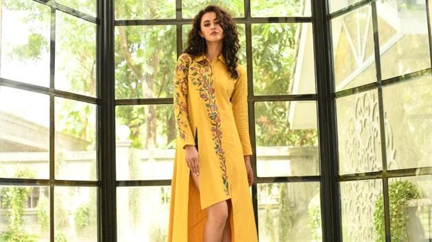 This wedding season, make a statement with an organza sharara in yellow, with silver tilla and Parsi embroidery detailed with elegant crystal embellishments. Fashion designer Dolly J, suggests the colour yellow can be creatively paired with white or lighter shades.