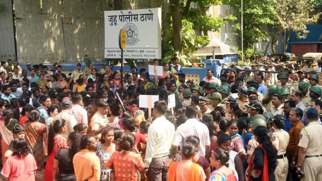 A large crowd gathered outside Juhu police station on Saturday, demanding justice for the minor. They dispersed only after police assured them a watertight charge sheet would be filed against the accused, Devendra Gundappa. (Pramod Thakur/HT Photo) A large crowd gathered outside Juhu police station on Saturday, demanding justice for the minor. They dispersed only after police assured them a watertight charge sheet would be filed against the accused, Devendra Gundappa. (Pramod Thakur/HT Photo)