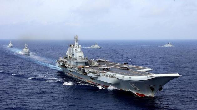 China's aircraft carrier Liaoning takes part in a military drill of Chinese People's Liberation Army (PLA) Navy in the western Pacific Ocean, in April 2018.(REUTERS File Photo) China's aircraft carrier Liaoning takes part in a military drill of Chinese People's Liberation Army (PLA) Navy in the western Pacific Ocean, in April 2018.(REUTERS File Photo)