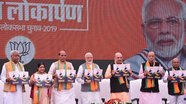 Releasing the BJP Sankalp Patra, or manifesto, for Lok Sabha elections 2019, PM Modi said the government was moving ahead with ‘one mission and one direction. He said the development had to be flexible to suit the country’s diversity, it had to be multi-layered and multi-directional. The party manifesto charted 75 milestones India @75 had to achieve, chief focus being on the farm sector, education, health and infrastructure. (Arvind Yadav / HT Photo) Releasing the BJP Sankalp Patra, or manifesto, for Lok Sabha elections 2019, PM Modi said the government was moving ahead with ‘one mission and one direction. He said the development had to be flexible to suit the country’s diversity, it had to be multi-layered and multi-directional. The party manifesto charted 75 milestones India @75 had to achieve, chief focus being on the farm sector, education, health and infrastructure. (Arvind Yadav / HT Photo)