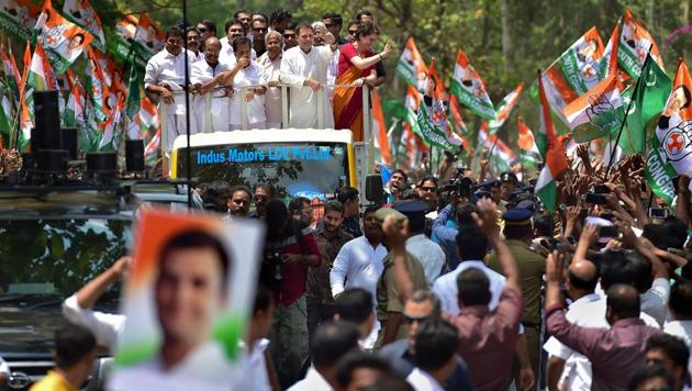 Congress President Rahul Gandhi along with party General Secretary and Uttar Pradesh-east in-charge Priyanka Gandhi Vadra and other leaders wave at party supporters during a roadshow ahead of his nomination filing, in Wayanad, April 4(PTI) Congress President Rahul Gandhi along with party General Secretary and Uttar Pradesh-east in-charge Priyanka Gandhi Vadra and other leaders wave at party supporters during a roadshow ahead of his nomination filing, in Wayanad, April 4(PTI)