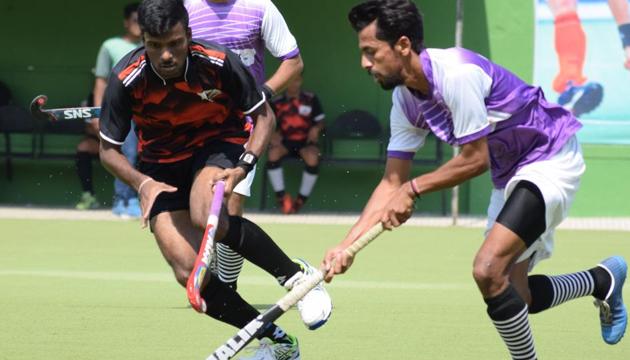 Vikram Pillay Academy ‘B’ (black)VS Green Medows in action at the inaugural Mar Osthathios Invitational Hockey Tournament at the Major Dhyan Chand Hockey Poligras Stadium, Nehrunagar-Pimpri here on Sunday (HT/PHOTO) Vikram Pillay Academy ‘B’ (black)VS Green Medows in action at the inaugural Mar Osthathios Invitational Hockey Tournament at the Major Dhyan Chand Hockey Poligras Stadium, Nehrunagar-Pimpri here on Sunday (HT/PHOTO)