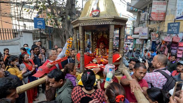 Meanwhile a child revered as the Hindu Living Goddess Kumari was carried out of the palace temple and brought to watch the horse festival. (Praksh Mathema / AFOP) Meanwhile a child revered as the Hindu Living Goddess Kumari was carried out of the palace temple and brought to watch the horse festival. (Praksh Mathema / AFOP)