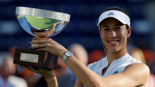 Spain's Garbine Muguruza celebrates winning the Monterrey Open with the trophy (REUTERS) Spain's Garbine Muguruza celebrates winning the Monterrey Open with the trophy (REUTERS)