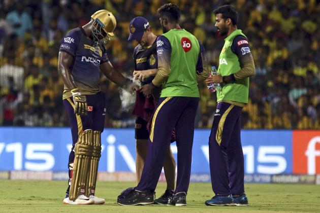 Kolkata Knight Riders's Andre Russell is attended to by the medical team after his left wrist was injured. (AP) Kolkata Knight Riders's Andre Russell is attended to by the medical team after his left wrist was injured. (AP)