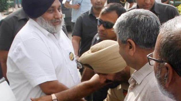 DSP Karansher Singh has been served notice for touching Sukhbir Singh Badal’s feet during a party event in Bathinda on Sunday.(HT Photo)