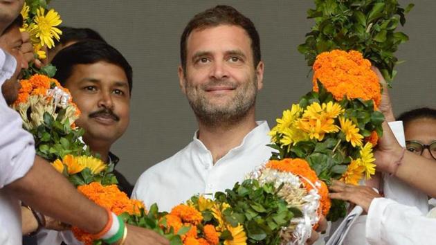 Congress president Rahul Gandhi being facilitated with a garland by the party supporters during a public meeting at Panchgram in Hailakandi District on Tuesday. (ANI file photo) Congress president Rahul Gandhi being facilitated with a garland by the party supporters during a public meeting at Panchgram in Hailakandi District on Tuesday. (ANI file photo)