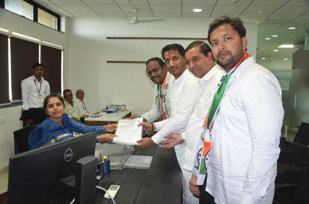 Parth Pawar(third from right), NCP candidate on Tuesday, filed the nomination form and declared his assets. (HT PHOTO) Parth Pawar(third from right), NCP candidate on Tuesday, filed the nomination form and declared his assets. (HT PHOTO)