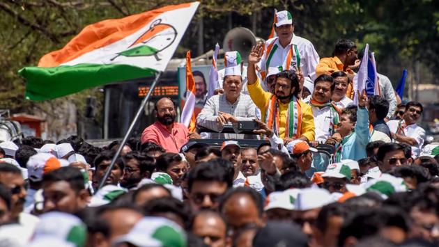 NCP candidate, Dr Amol Kolhe (yellow shirt) at a packed rally in front of collector office before he goes to fill his application for election in Shirur constituency  as part of Kolhe’s political campaign on Tuesday. (SANKET WANKHADE/HT PHOTO) 