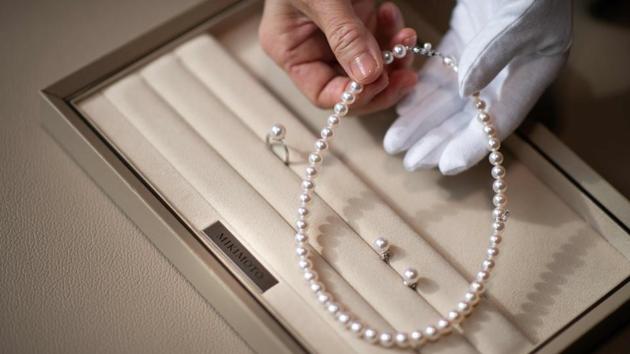 “For the Japanese, pearls are a family heirloom. We give them as necklaces to women about to marry or as earrings or rings,” said Mikimoto boss Hiroshi Yoshida. They then wear them at grand occasions for the rest of their lives. But perhaps an indication of a shift in the global economy: more than half of Mikimoto’s customers are Chinese. After them come Americans, other Asians, and then Europeans. (Martin Bureau / AFP)