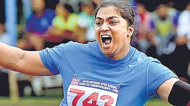 Manpreet Kaur reacts after setting a new National Record in the women's shot put event.(PTI)