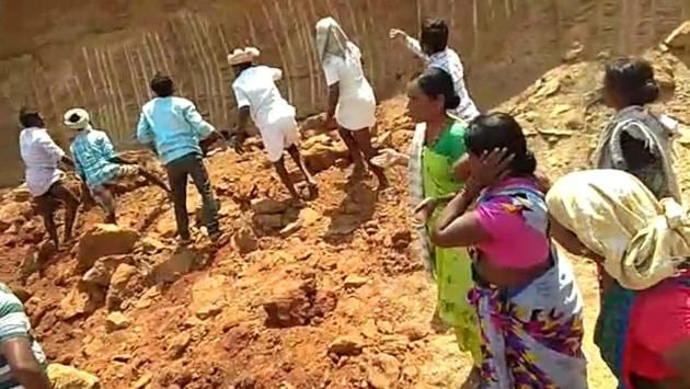 At least 10 labourers, all women, were killed after a mound of earth collapsed burying them alive in Telangana. They were employed under the Mahatma Gandhi National Rural Employment Guarantee Programme (MGNREGP) at Tileru village of Marikal block in Narayanpet district of the state. (ANI) At least 10 labourers, all women, were killed after a mound of earth collapsed burying them alive in Telangana. They were employed under the Mahatma Gandhi National Rural Employment Guarantee Programme (MGNREGP) at Tileru village of Marikal block in Narayanpet district of the state. (ANI)