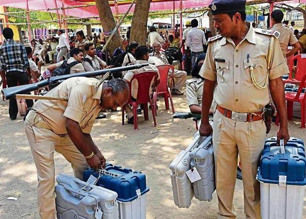 Security officials carry EVMs in Jamui on Wednesday. (ANI) Security officials carry EVMs in Jamui on Wednesday. (ANI)