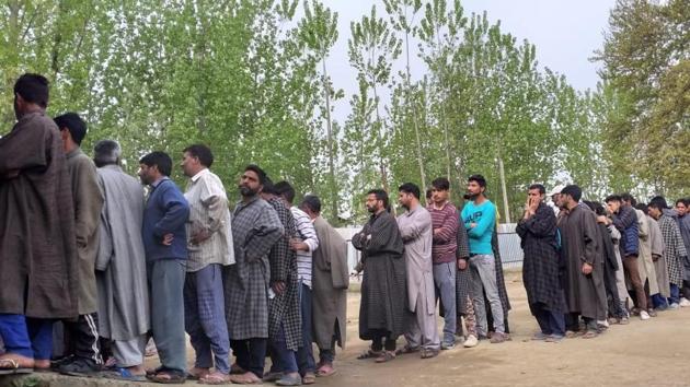 Men lined up at a polling centre Baramulla’s seat’s Bandipore district. Two seats in the violence-hit Jammu and Kashmir, Jammu and Baramulla, are voting today amid a boycott call by separatists and tight security to offset protests. In the sensitive Baramulla seat, three-tier security is in place with 400 additional companies deployed. Officials said around 30,000 additional forces have been deployed. (Waseem Andrabi / HT Photo) Men lined up at a polling centre Baramulla’s seat’s Bandipore district. Two seats in the violence-hit Jammu and Kashmir, Jammu and Baramulla, are voting today amid a boycott call by separatists and tight security to offset protests. In the sensitive Baramulla seat, three-tier security is in place with 400 additional companies deployed. Officials said around 30,000 additional forces have been deployed. (Waseem Andrabi / HT Photo)