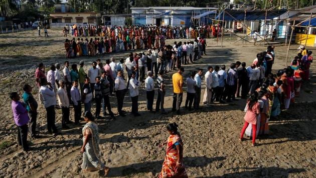 Voters line up outside a polling station in Alipurduar district in West Bengal. The districts of Cooch Behar and Alipurduar are the two constituencies in West Bengal to go to polls in the first phase. The ruling Trinamool Congress and the BJP are the main contenders in the two north Bengal seats. (Rupak De Chowdhuri / REUTERS) Voters line up outside a polling station in Alipurduar district in West Bengal. The districts of Cooch Behar and Alipurduar are the two constituencies in West Bengal to go to polls in the first phase. The ruling Trinamool Congress and the BJP are the main contenders in the two north Bengal seats. (Rupak De Chowdhuri / REUTERS)