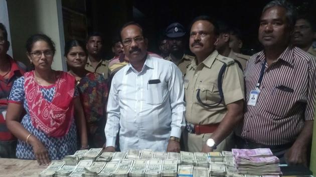 Election monitoring officials display some 20 million rupees seized by a flying squad in Perambalur, Tamil Nadu. “The unlimited flow of money and its use to induce voters is increasing and we can see it with the nationwide cash seizures by authorities,” Anil Verma, head of ADR’s National Election Watch unit, told AFP. (Election Control Centre - Perambalur / Handout / AFP) Election monitoring officials display some 20 million rupees seized by a flying squad in Perambalur, Tamil Nadu. “The unlimited flow of money and its use to induce voters is increasing and we can see it with the nationwide cash seizures by authorities,” Anil Verma, head of ADR’s National Election Watch unit, told AFP. (Election Control Centre - Perambalur / Handout / AFP)