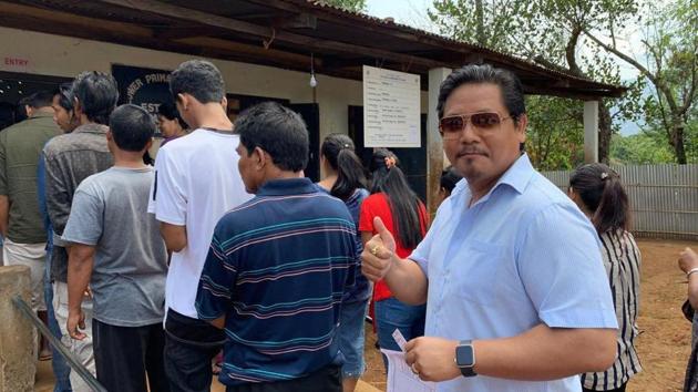 Meghalaya Chief Minister Conrad K Sangma stands in a queue to cast his vote during the first phase of the general elections, at Tura in West Garo Hills district of Meghalaya. Nearly 21% of the 19,14,795 electors with 52% women cast their votes in the first two hours in Shillong and Tura Lok Sabha constituencies in Meghalaya amid reports of technical snags in EVMs. (PTI) Meghalaya Chief Minister Conrad K Sangma stands in a queue to cast his vote during the first phase of the general elections, at Tura in West Garo Hills district of Meghalaya. Nearly 21% of the 19,14,795 electors with 52% women cast their votes in the first two hours in Shillong and Tura Lok Sabha constituencies in Meghalaya amid reports of technical snags in EVMs. (PTI)