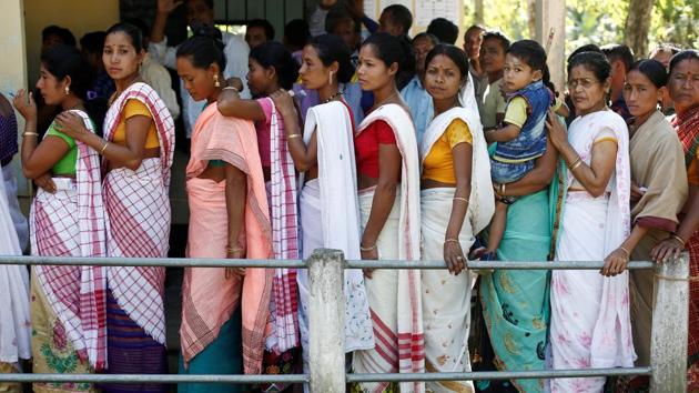 People line up to cast their votes outside a polling station in Majuli. Voting is underway for the five of a total 14 Lok Sabha seats in Assam in the first phase, across 9 ,574 polling stations in the constituencies of Kaliabar, Tezpur, Jorhat, Dibrugarh and Lakhimpur. A total of 76,03,458 electorates are eligible to cast their ballots. A total of 41 candidates are in the fray. (Adnan Abidi / REUTERS) People line up to cast their votes outside a polling station in Majuli. Voting is underway for the five of a total 14 Lok Sabha seats in Assam in the first phase, across 9 ,574 polling stations in the constituencies of Kaliabar, Tezpur, Jorhat, Dibrugarh and Lakhimpur. A total of 76,03,458 electorates are eligible to cast their ballots. A total of 41 candidates are in the fray. (Adnan Abidi / REUTERS)