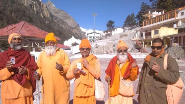 102-year- old seer Ramanand Saraswati (second from right) along with other seers in Gangotri shrine where for the first time a polling booth was established for Lok Sabha elections. All five seats in Uttarakhand voted in first phase on April 11, 2019. 102-year- old seer Ramanand Saraswati (second from right) along with other seers in Gangotri shrine where for the first time a polling booth was established for Lok Sabha elections. All five seats in Uttarakhand voted in first phase on April 11, 2019.