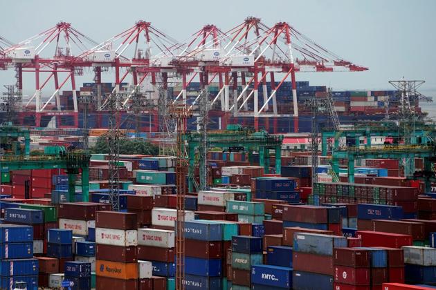Shipping containers are seen at a port in Shanghai, China (REUTERS File) Shipping containers are seen at a port in Shanghai, China (REUTERS File)