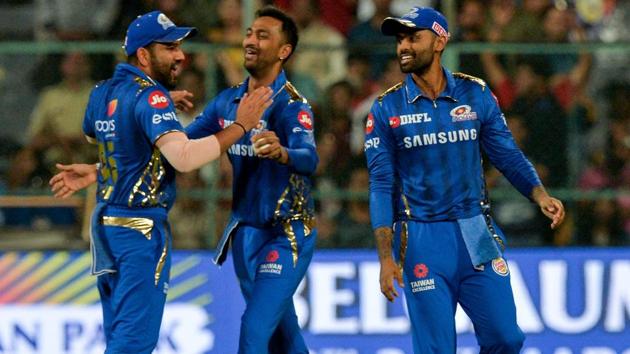 Mumbai Indians fielder Suryakumar Yadav (C) celebrates with his captain Rohit Sharma (L). (AFP)