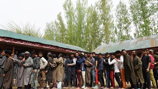 Srinagar, India - April 11, 2019: Voters stand in a queue to cast their votes outside a polling station in Shelvat, Bandipora district, some 30 Kms from Srinagar, India, on Thursday, April 11, 2019. (Photo by Waseem Andrabi / Hindustan Times)