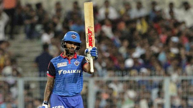 Delhi Capitals' Shikhar Dhawan raises his bat after scoring fifty runs. (AP)