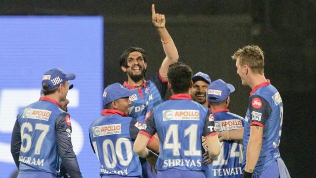 Delhi Capitals Ishant Sharma gestures and other teammates celebrate dismissal of Kolkata Knight Riders' Joe Denly. (AP)