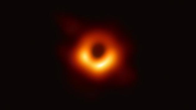 A handout shows the first photograph of a black hole and its fiery halo, released by Event Horizon Telescope astronomers (EHT), which is the “most direct proof of their existence,” one of the project’s lead scientists told AFP. (European Southern Observatory / AFP) 