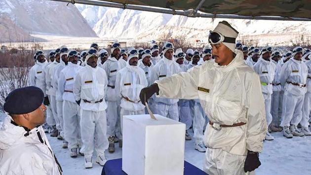 An army soldier casts his vote for the Lok Sabha elections as a Service voter, at Field Post Office in Siachen. In a first-of-its-kind the Election Commission provided the facility to the troops deployed in far flung, remote and inhospitable terrain to download their ballot papers online, vote and forward the ballot papers to their respective Electoral Returning Officers through post. (PTI) An army soldier casts his vote for the Lok Sabha elections as a Service voter, at Field Post Office in Siachen. In a first-of-its-kind the Election Commission provided the facility to the troops deployed in far flung, remote and inhospitable terrain to download their ballot papers online, vote and forward the ballot papers to their respective Electoral Returning Officers through post. (PTI)