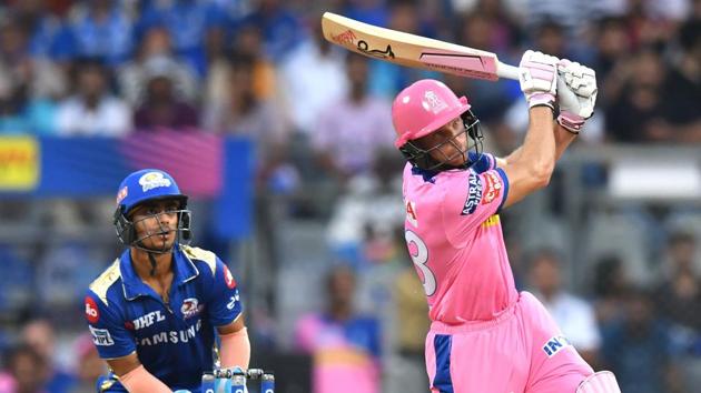 Rajasthan Royals batsman Jos Buttler (R) plays a shot during the 2019 Indian Premier League (IPL) Twenty20 cricket match between Mumbai Indians and Rajasthan Royals at the Wankhede Stadium in Mumbai. (AFP)