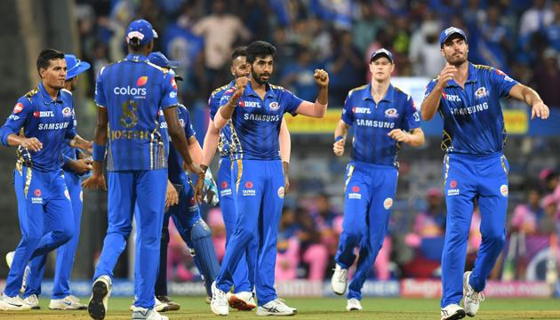 Mumbai Indians cricketers celebrate after the wicket of Rajasthan Royals batsman Steven Smith during the 2019 Indian Premier League (IPL) Twenty20 cricket match between Mumbai Indians and Rajasthan Royals at the Wankhede Stadium in Mumbai. (AFP)