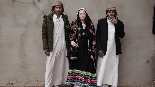 An Egyptian student borrows a Bedouin wedding dress for a photograph with Hamada Bedouin men. “I think south Sinai is safe especially when you are in the care of Bedouins. ... This is where I feel at home. Every corner there is scenery and another beautiful view,” said Marion Salwegter, a 68-year-old Dutch woman who travels to southern Sinai every year alone to escape the winters in Holland. (Nariman El-Mofty / AP) 