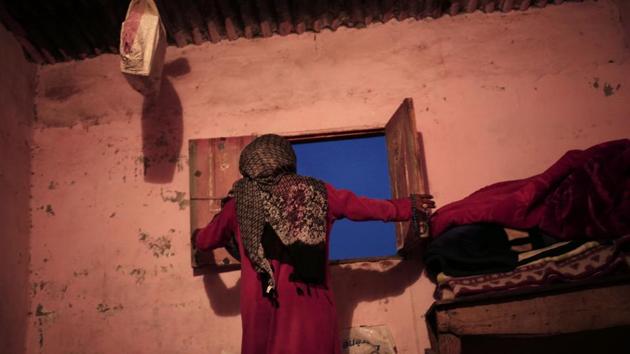Umm Yasser at the windows of her home. Some attitudes are changing. Mohammed Salman, an elderly man from the Aligat tribe, said he thought the guides project was a great step for women. “If a woman wants to work, she should be able to have the right to,” he said. “Many men say no, a woman’s place is at home. But I’m sick of this ideology. She’s a human being.” (Nariman El-Mofty / AP) 