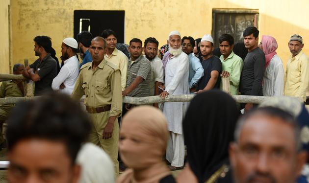 People stand in queues to cast their votes during the first phase of the Lok Sabha elections, at Sawal village, in Uttar Pardesh, India, on Thursday, April 11, 2019.(Raj K Raj/HT PHOTO) People stand in queues to cast their votes during the first phase of the Lok Sabha elections, at Sawal village, in Uttar Pardesh, India, on Thursday, April 11, 2019.(Raj K Raj/HT PHOTO)