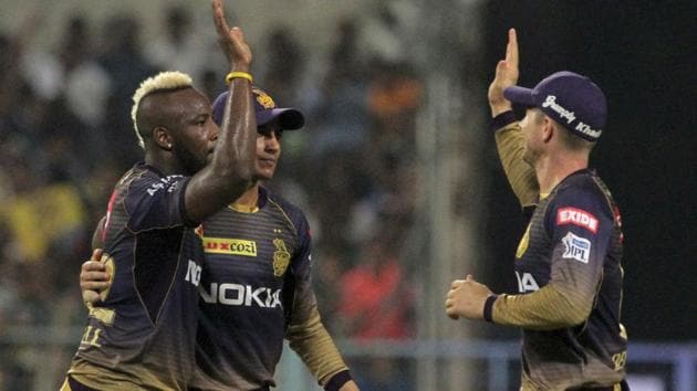 Kolkata Knight Riders Andre Russell celebrates with his teammates after the fall of a wicket.(AP)