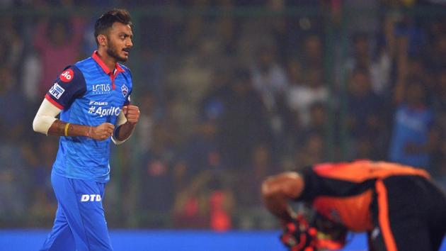 Delhi Capitals bowler Axar Patel (L) celebrates after he dismissed Sunrisers Hyderabad cricketer Vijay Shanker.(AFP)