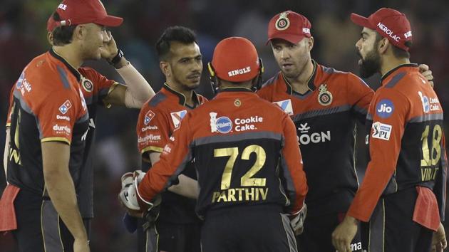 Yuzvendra Chahal of Royal Challengers Bangalore, second left, celebrates the wicket of KL Rahul. (AP)