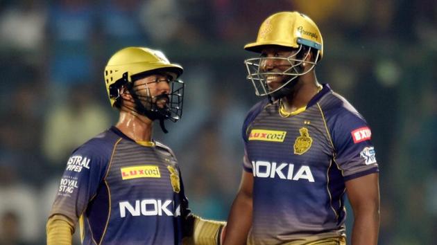 File image of Andre Russell and Dinesh Karthik. (PTI) File image of Andre Russell and Dinesh Karthik. (PTI)