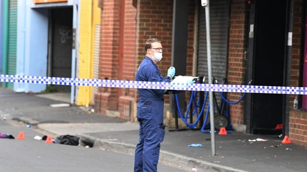 A Victoria Police personnel works at the scene of a multiple shooting outside Love Machine nightclub in Prahran, Melbourne, Australia(REUTERS)