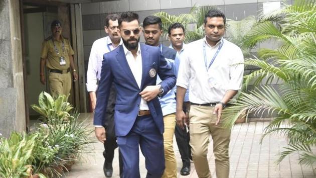 Indian cricket captain Virat Kohli leaves Board of Control for Cricket (BCCI) office after a meeting with the selection committee, in Mumbai. On Monday, the BCCI announced the 15-member squad for the ICC World Cup. Dinesh Karthik has been included in the squad as the back-up wicket-keeper in place of the widely tipped Rishabh Pant. Vijay Shankar is also in the mix and is being considered for the number four slot. (Kunal Patil / HT Photo)