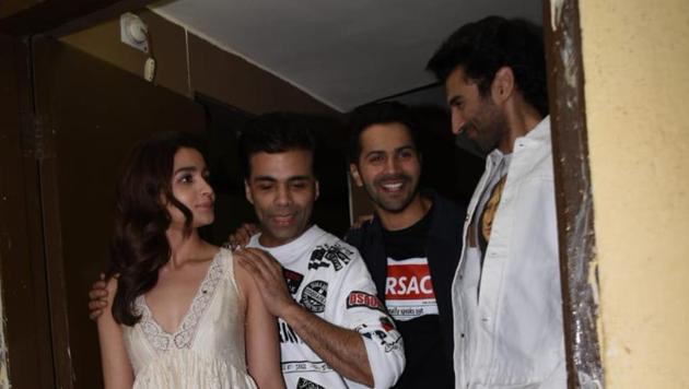 Alia Bhatt, Varun Dhawan, Karan Johar and Aditya Roy Kapoor share a joke.(Varinder Chawla)