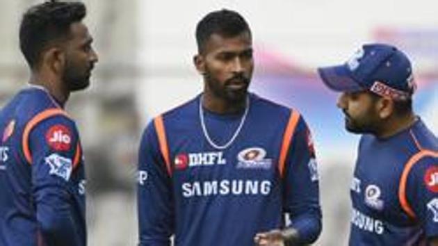 Mumbai : Mumbai Indian's captain Rohit Sharma with teammates Krunal and Hardik Pandya during a practice session on the eve of their IPL T -20 match against Delhi Capitals in Mumbai, Saturday, March 23, 2019. (PTI) Mumbai : Mumbai Indian's captain Rohit Sharma with teammates Krunal and Hardik Pandya during a practice session on the eve of their IPL T -20 match against Delhi Capitals in Mumbai, Saturday, March 23, 2019. (PTI)