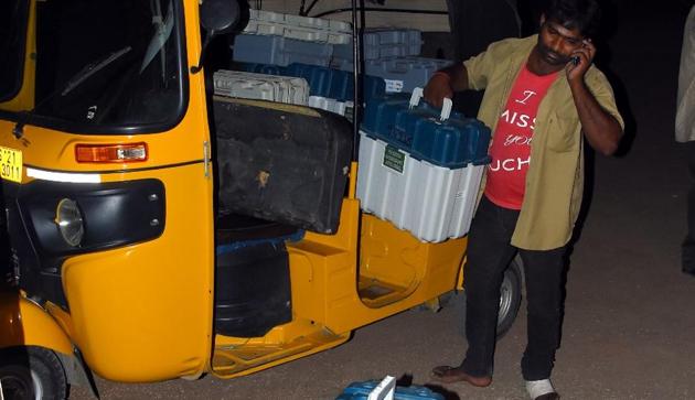 The dummy EVMs were being shifted from the local tehsildar’s office to the strong room at the Indoor Stadium in Jagitial in an auto rickshaw. (HT PHOTO) The dummy EVMs were being shifted from the local tehsildar’s office to the strong room at the Indoor Stadium in Jagitial in an auto rickshaw. (HT PHOTO)