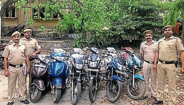 Policemen with the recovered two-wheelers.(Handout) Policemen with the recovered two-wheelers.(Handout)