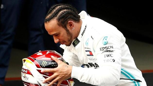 Formula One F1 - Chinese Grand Prix - Shanghai International Circuit, Shanghai, China - April 14, 2019 Mercedes' Lewis Hamilton celebrates winning the race(REUTERS)