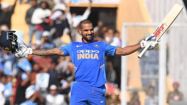 India cricketer Shikhar Dhawan raises his bat after his century. (AFP) India cricketer Shikhar Dhawan raises his bat after his century. (AFP)
