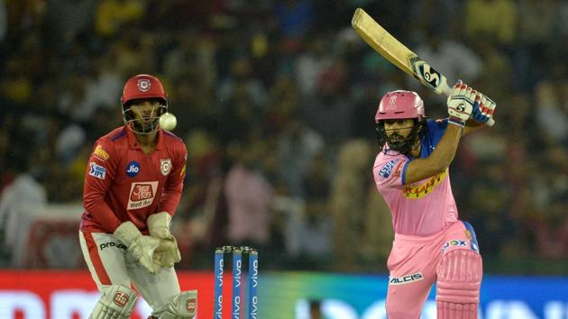 Rajasthan Royals cricketer Jos Buttler (R) is watched by Kings Xi Punjab wicketkeeper Nicholas Pooran. (AFP) Rajasthan Royals cricketer Jos Buttler (R) is watched by Kings Xi Punjab wicketkeeper Nicholas Pooran. (AFP)