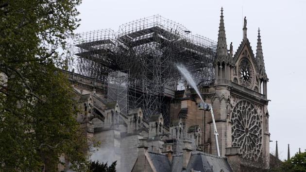 The main structure of Notre Dame cathedral in central Paris was saved after hours of fire-fighting to put out a devastating blaze, the city’s top fire official said late Monday. It appeared that the two main towers of the building had been saved. (Zakaria Abdelkafi / AFP) The main structure of Notre Dame cathedral in central Paris was saved after hours of fire-fighting to put out a devastating blaze, the city’s top fire official said late Monday. It appeared that the two main towers of the building had been saved. (Zakaria Abdelkafi / AFP)