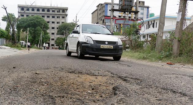 Residents of New Palam Vihar have asked the authorities to fix the road between Rezangla Chowk and Chauma railway crossing, which is riddled with potholes, ahead of monsoon. Residents of New Palam Vihar have asked the authorities to fix the road between Rezangla Chowk and Chauma railway crossing, which is riddled with potholes, ahead of monsoon.